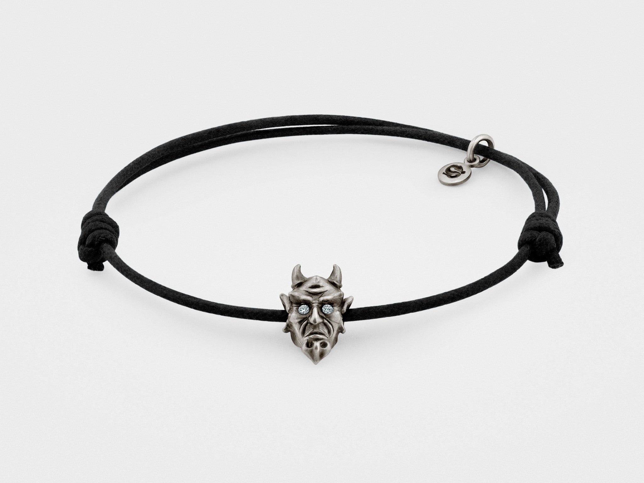 Bracelet diable en argent foncé avec yeux clairs ou rouges