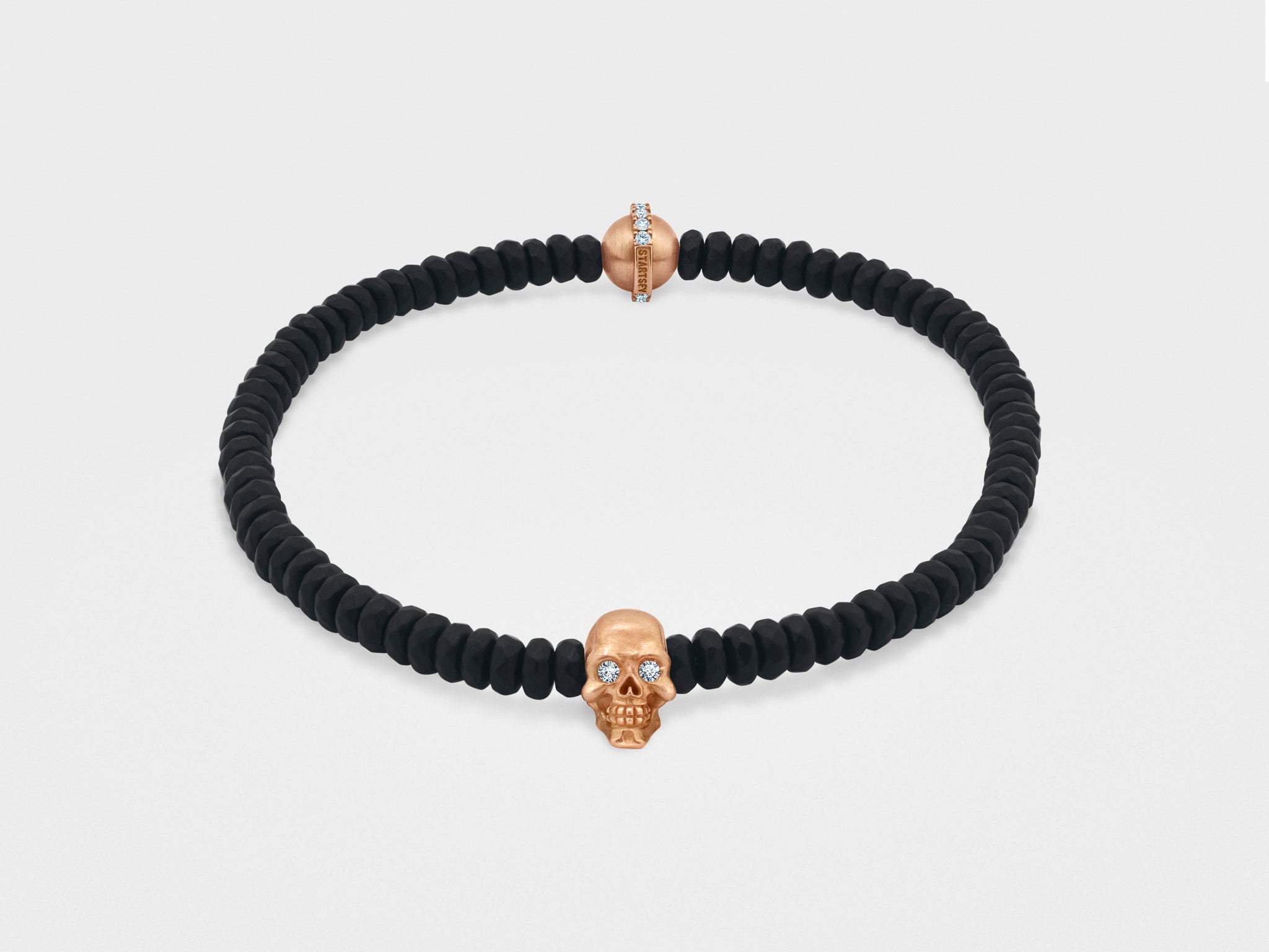 Bracelet tête de mort avec perle noire à facettes